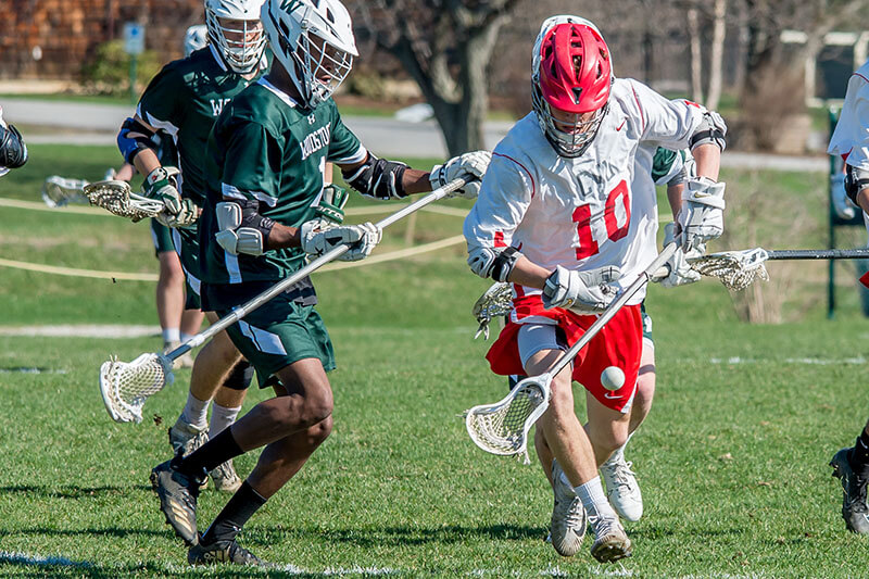 Max Gorman picks the ball on the move against Woodstock. Photo by Al Frey