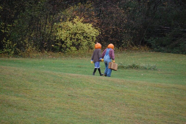 The last time: Pumpkin Man waves good-bye