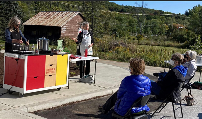 The library’s new “Charlie Cart” portable kitchen unit was used to discuss the general basics of canning and the array of possibilities in preserving food this way. Photo by Margaret Woodruff