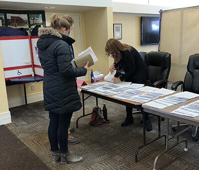 Town Hall was pretty quiet on Election Day this year; a high return of absentee votes meant short lines and small crowds. Photo by Chea Waters Evans