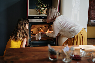 Cooking with Grandma. Photo by cottonbro from Pexels