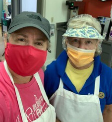 Sherry Beaty, who runs the Charlotte Central School kitchen, and Linda Gilbert prepared meal deliveries.