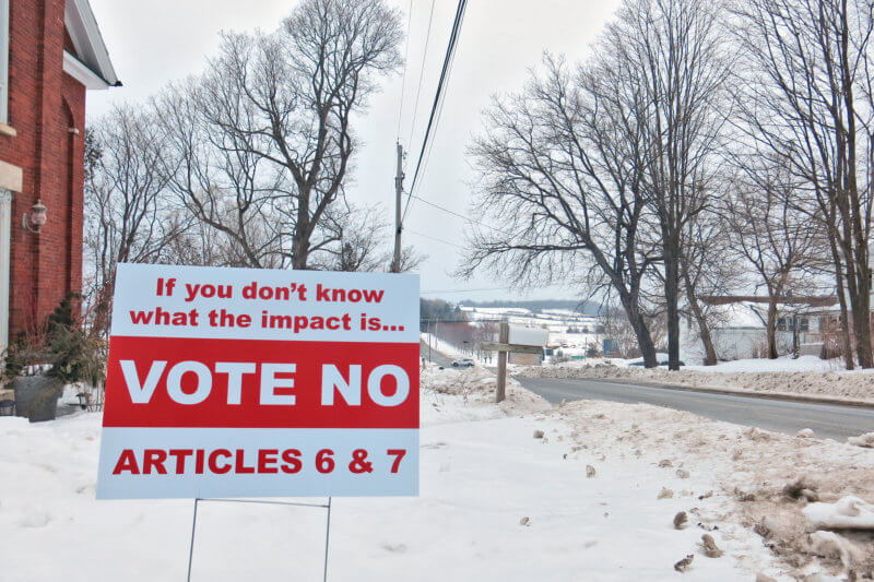 Signs urging voters to vote no on next week’s ballot items have gone missing from people’s lawns.Photo by Alex Bunten