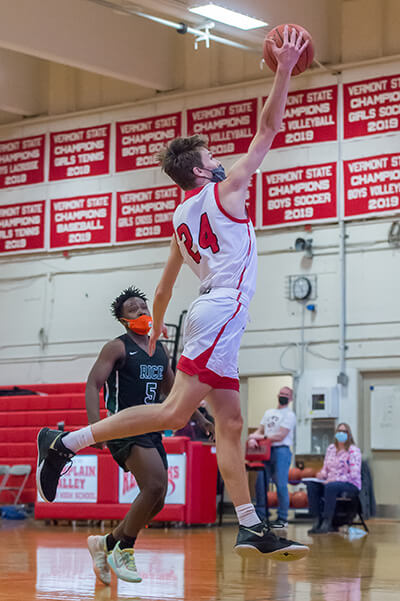 Devin Rogers hits for two.Photo by Al Frey