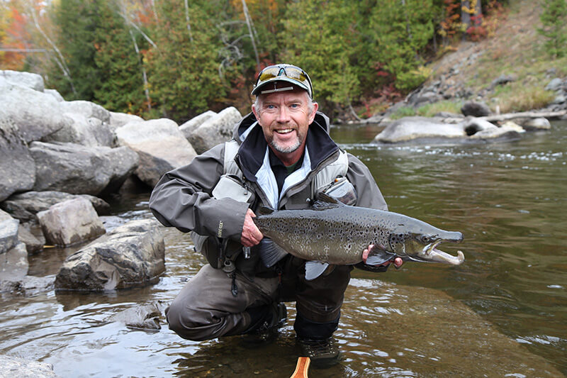 Mark Wilde with a salmon that didn’t get away in the Clyde River in Newport. Photo contributed.