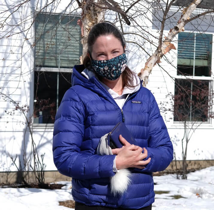 Tina Helzer came from the tennis court to Town Hall to cast her vote. Photo by Ethan Putnam