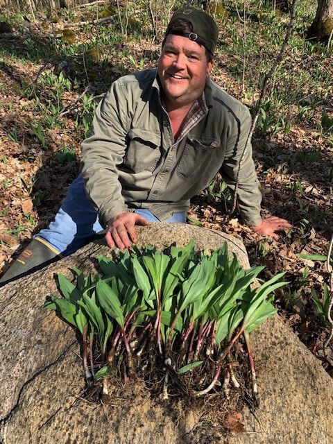 Bradley Carleton with some fresh wild ramps harvested with love. Photo contributed