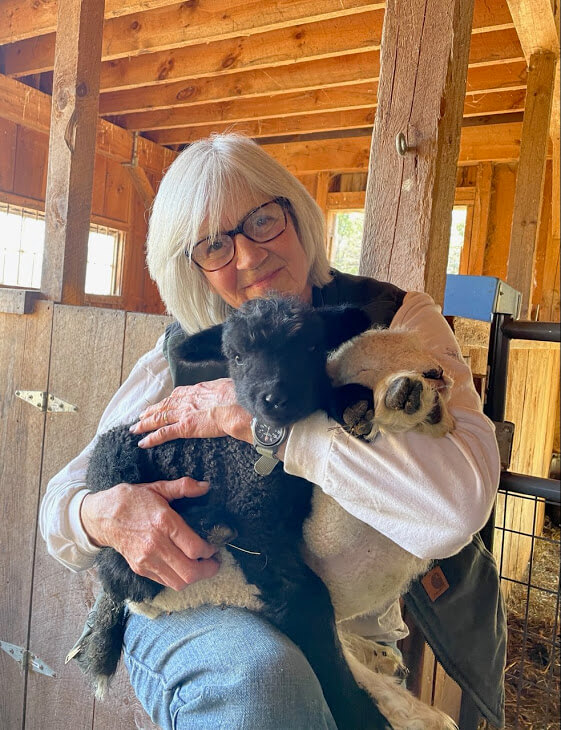 Kathherine Knox holds Ginger (dark) and Kukicha (white). Photo by Phyl Newbeck