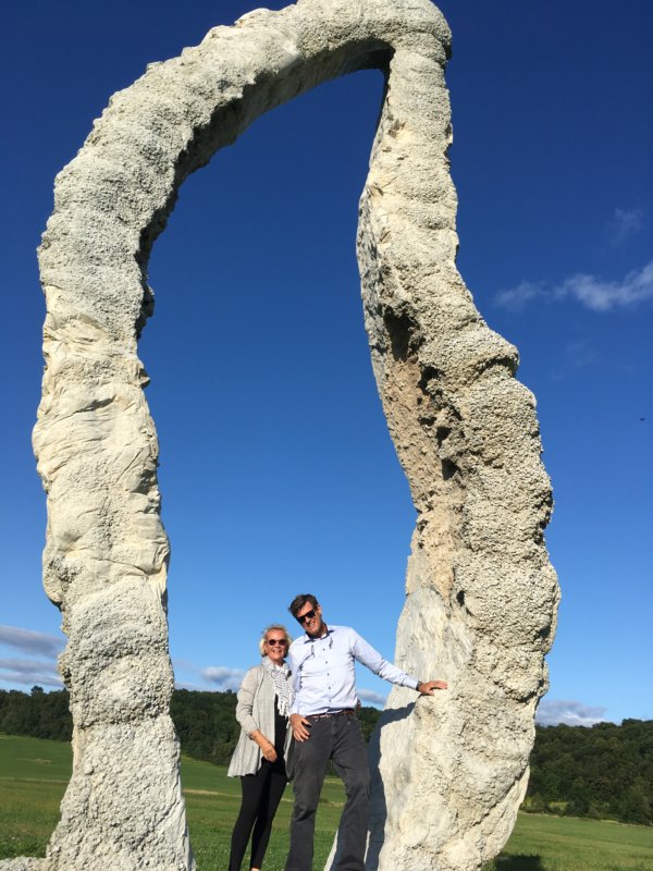 Left: Sculpture, Leap of Faith by Pater Lundberg. Standing with the sculpture are Anna and Reed Von Gal who is 6’ 4” Photo contributed