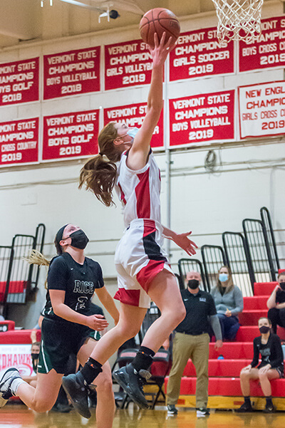 Catherine Gilwee lays in two against Rice.Photo by Al Frey