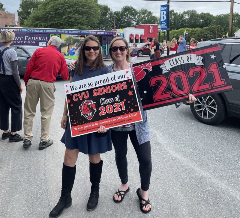 Traffic lined Pearl St. as friends and family came to support the class of 2021. Faculty and staff cheered with signs as cars arrived. Teachers Heidi Dostal (left) and Karen Rodgers (right) said they were “super proud,” and described the students as “superheroes.” Dostal said, “they can make it through anything after they made it through this year.” Photo by Nick Bishop