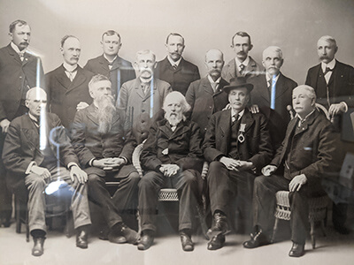 The Charlotte Masons (who met in what is now Friendship Lodge #24 on Church Hill Rd). Seated left to right: Henry Newell, Dr W.H.H. Varney, Henry Leavenworth, John Thorpe, Mort Allen; Standing left to right: Millard Muzzy, Dr. Fred P. Stoddard, Will Dean, Powell Read, Charles Russell, Alonzo Stearns, Horace Saxton, Dick Edgerton, Stoddard Martin. Photo credit: Charlotte Historical Society Collection