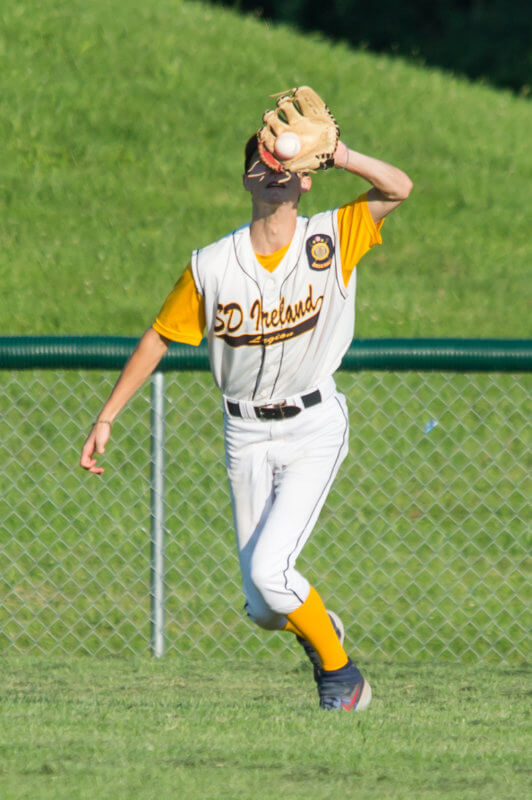 Sun in his eyes, ball in his glove. Photo by Al Frey