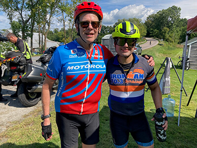 L to R: Jim Gallagher of Garden City, NY and Edgar Rico of Long Island, NY at a Kelly Brush Foundation fuel station in Charlotte. Photo by Gail Callahan