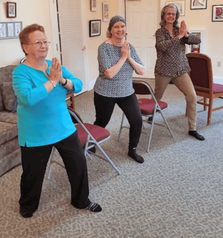 A few students from Chair Yoga class: Rosemarie Cartularo, Lisa Hudkin, Tiny Sikkes, instructor. Photo by Carolyn Kulik