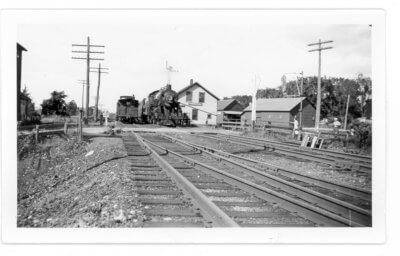 Early 20th century photo of the Charlotte Station with a steam engine, comparable to the one in the article. The engine would have stopped at approximately this location after the accident. (Credit Charlotte Historical Photos, compiled by the Charlotte Land Trust, produced by Perceptions, Inc., 2003)