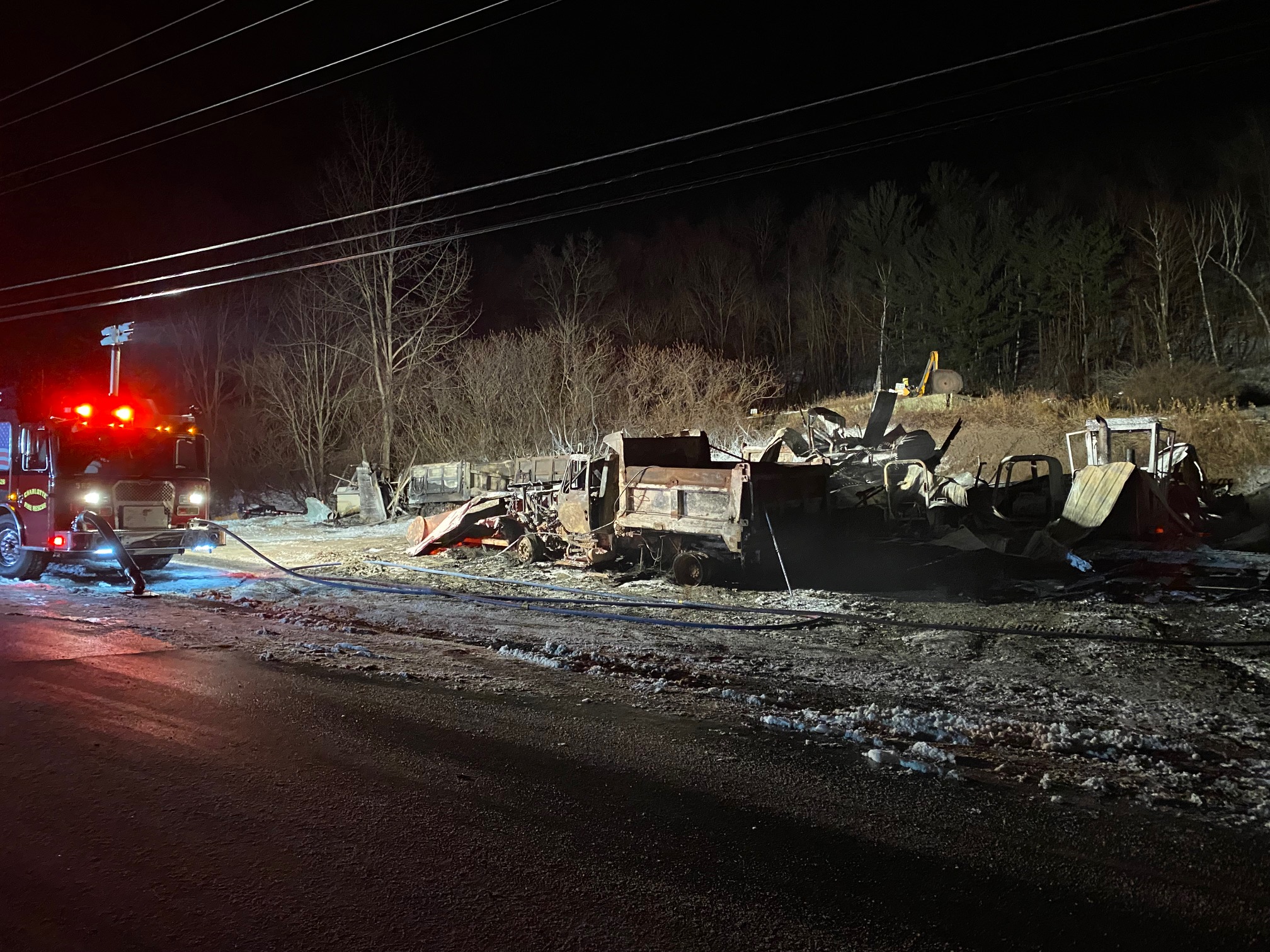 The fire at Lewis Excavating’s garage on Church Hill Road, destroyed the garage and all of the trucks and equipment stored there, including several snow plows and trucks. Photo contributed