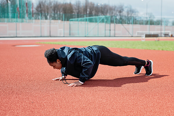 Exercising. Photo by Mikhail Nilov from Pexels