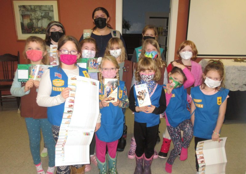 Girl scouts Troop 30066 is ready to selling you many boxes of cookies. Photo contributed.