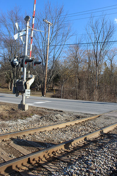 Photo by Scooter MacMillan. The rail crossing on Ferry Road west of Charlotte West Village.