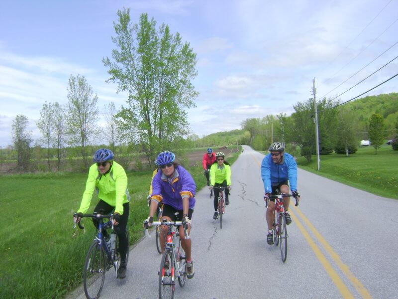 Courtesy photo. Phyl Newbeck in purple jacket riding with the Green Mountain Bicycle Club’s St. Albans Explorer ride. This year this ride is May 29.