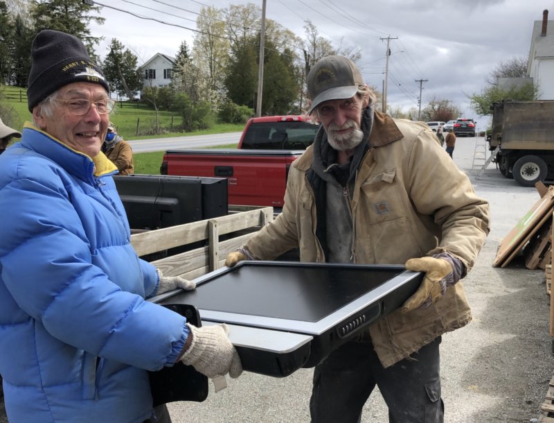 Photo by Ruah Swennerfelt. Louis Cox, left, and Ken Spencer collect electronic waste collection at a previous Green Up Day. This year the quest for the holy grail of litterless roadways is 9 a.m.-4 p.m. this Saturday, May 7, and they’re still looking for people to join in. You can sign up for a route to pick up litter on the website charlottevtgreenupday.com by 6 p.m. Friday or you can show up Saturday morning at the collection center on the west side of Charlotte Central School on Hinesburg Road.