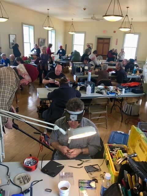 Photo contributed. Jamey Gerlaugh does electronic repair at a pre-COVID Repair Café.