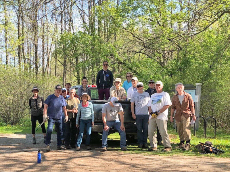 Photo contributed Jessie Bradley, front, in blue shirt and white hat, and a group of invasive species combatants getting ready to ply their prying invasives trade.