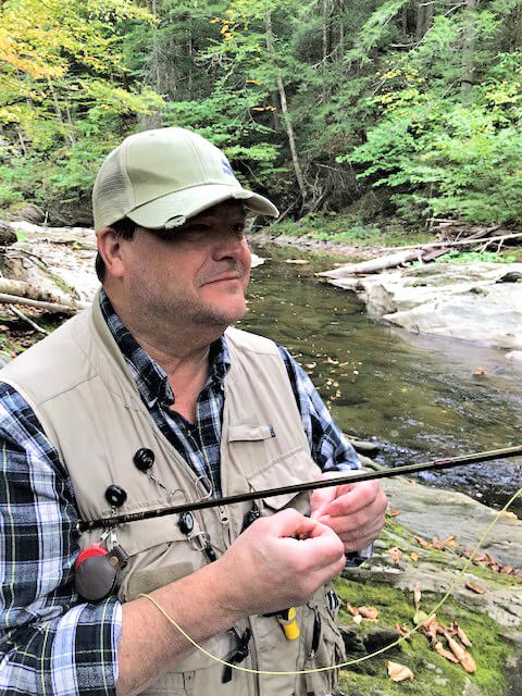 Bradly Carleton tying fly