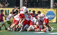 Photo by Al Frey The Champlain Valley Redhawks celebrate a hard fought 13-11 Division 1 boys lacrosse state championship win over the Burr and Burton Bulldogs on Saturday afternoon at the University of Vermont’s Virtue Field.