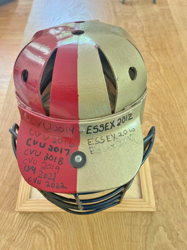 Courtesy photo The CVU boys lacrosse team won the Battle of the Bucket (or the Battle of the Old Timey Helmet) because of its regular season sweep of Essex.