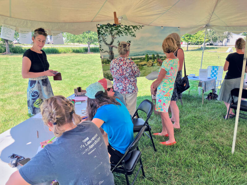 Courtesy photo. People appreciating art in one of the library’s many summer programs.