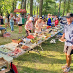 Photo by John Quinney Recreation commission chair Bill Fraser-Harris said more than 200 people attended the Town Party on July 16, and everybody brought a dish so there were more than eight tables of food.