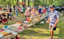 Photo by John Quinney Recreation commission chair Bill Fraser-Harris said more than 200 people attended the Town Party on July 16, and everybody brought a dish so there were more than eight tables of food.