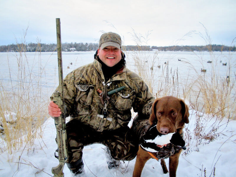 Courtesy photo. Bradley Carleton and Chessie duck hunting late in the season.