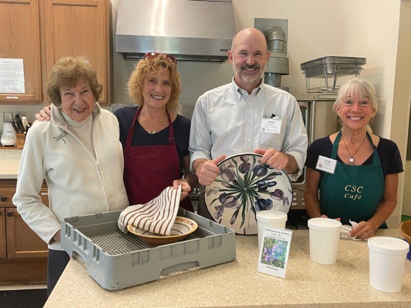 Photo by Lori York From left, senior center volunteer dishwashers Gail Bock, Laurie Hartman Moser, Brian Bock and Susan McDonald take time for a photo.