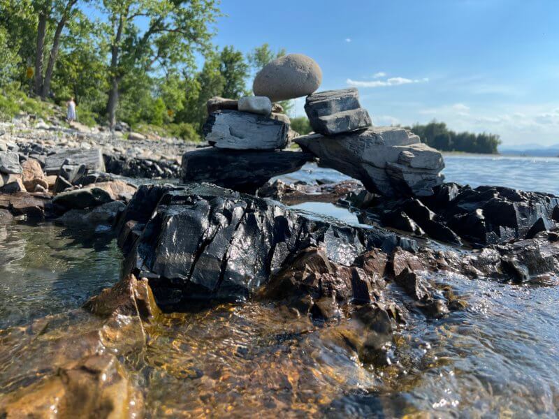 Courtesy photo An almost round rock completes and arch by an anonymous rock sculptor.