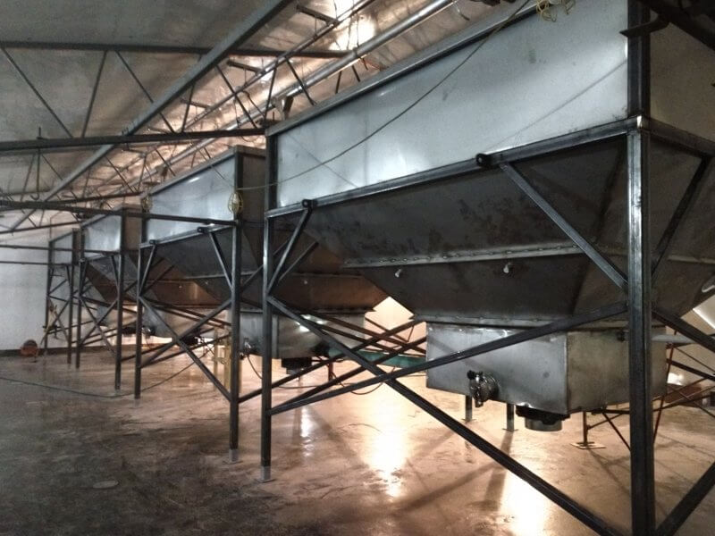 Photo by Juliann Phelps Newly installed steel tanks on the top floor of the Vermont Malthouse.