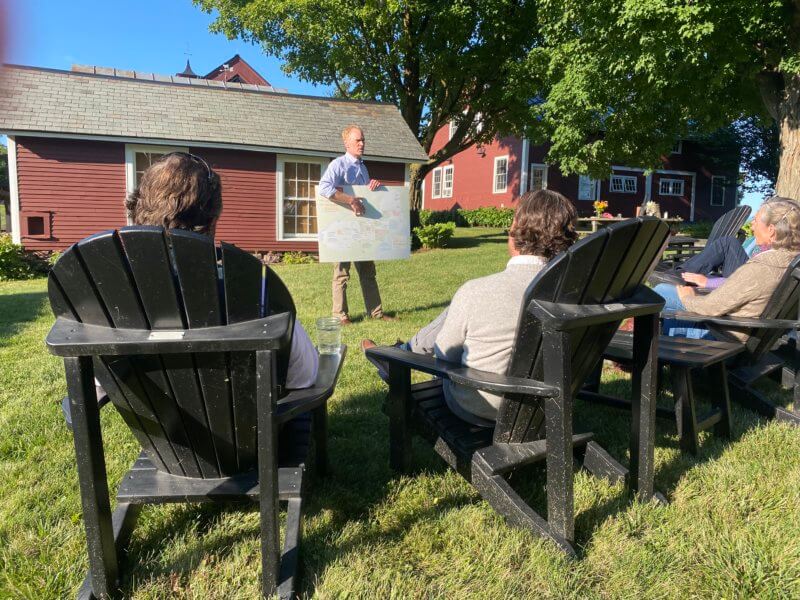 Photo by Scooter MacMillan Rob Riley of the Northern Forest Center shares his organization’s mission and vision with a group at Philo Ridge Farm.