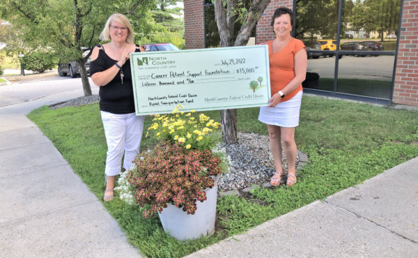 Courtesy photo From left, Sarah Lemnah, Cancer Patient Support Foundation executive director receives a check from Kathryn Lagerstedt of NorthCountry Federal Credit Union.