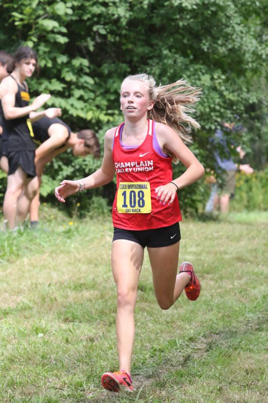 Photos by Paul Lamontagne/vt.sportsimages.com Left: Sophomore Alice Kredell of Shelburne finished the season with three first-place finishes, two seconds and a third at in-state cross country competitions and led the team to a state championship.