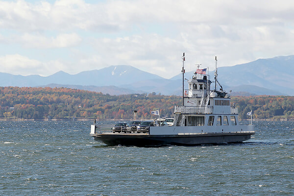 The Charlotte-Essex Ferry making its way across Lake Champlain. Photo by ©Heather Forcier