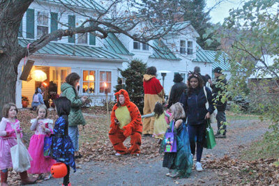Almost all the children, adults and homes were costumed..