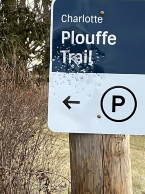 Photo by Larry Sommers A sign at Plouffe Lane and Carpenter Road that someone used a shotgun on. ‘We are better than this,’ selectboard chair Jim Faulkner said of the vandalism.