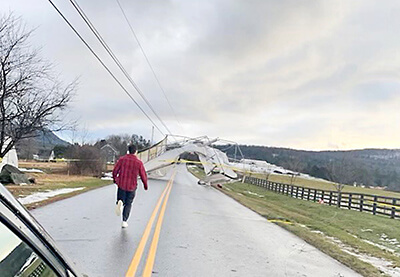 Photo by Bruno MurphyThe bomb cyclone took out power and shutdown traffic after the wind blew a hoop house over power lines on Mt. Philo Road just north of Hinesburg Road.