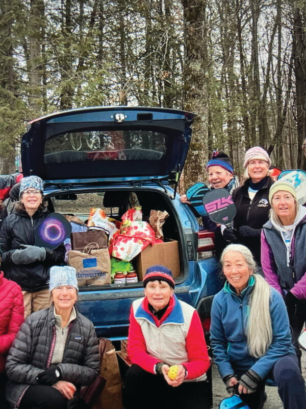 Photo by Lynn CluffThe Polar Pickle Ball team had a food drive. They completely filled a car with food from family and friends and brought it to the Charlotte Food Shelf.