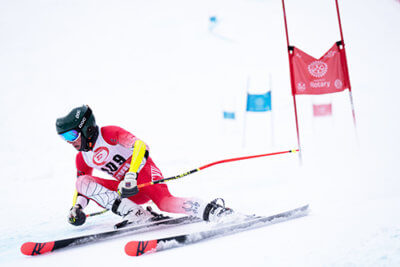 Photo by @devxphotoCVU Sophomore George Francisco competing at the Middlebury Snowbowl in the giant slalom.