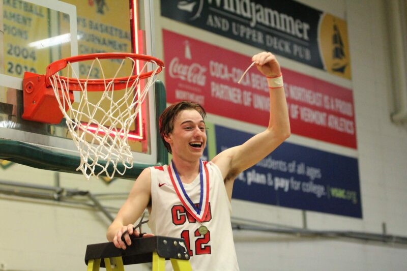 Photo by Amy Vaughan Alex Provost celebrates CVU’s first state boys hoops title. In the fall, as a member of the football team, he celebrated his school’s first football title.
