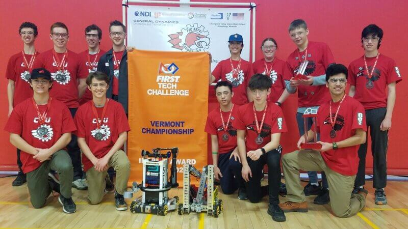 From left, (front) Joe Jacobs, Jack Gourlay, Gavin, Blackburn, Clay Nicholson, Will Ackerly (back) Sam Yager, Jared Kennedy, Crawford Phillips, Jaden Parker, James Haines, Violet Fennern, Braden Griffin and Jacob Graham are members of the Champlain Valley Union High robotics team headed to Houston in April to defend their state title.