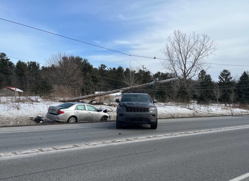 Courtesy photo A distracted and allegedly drug-impaired driver hit and knocked down a power pole on Friday on Route 7, shutting down traffic for a while.